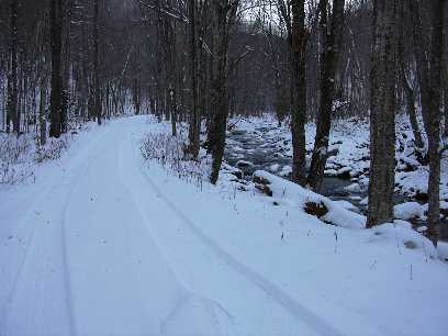 Trail follows railroad bed up Bolles Brook